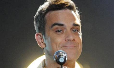 robbie williams gay|Robbie Williams gay: Singer reveals he is 49 per cent。